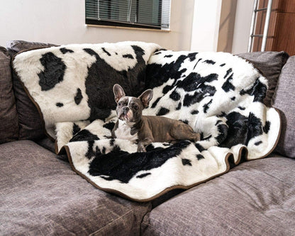PupProtector Waterproof Throw Blanket for Dogs and Cats, Pet Blanket Cover for Couches, Sofas, Beds, Car Seats, Furniture, Calming Soft Faux Fur, Black and White Cowhide, Original (60" L x 50" W)